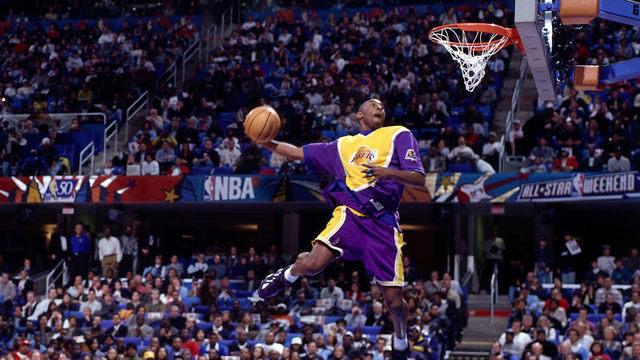 CLEVELAND - FEBRUARY 8: Kobe Bryant #8 of the Los Angeles Lakers goes up for one of his slam dunks that won first place in the NBA All-Star Slam Dunk Contest at Gund Arena on February 8, 1997 in Cleveland, Ohio. Mandatory copyright notice: Copyright NBAE 2002