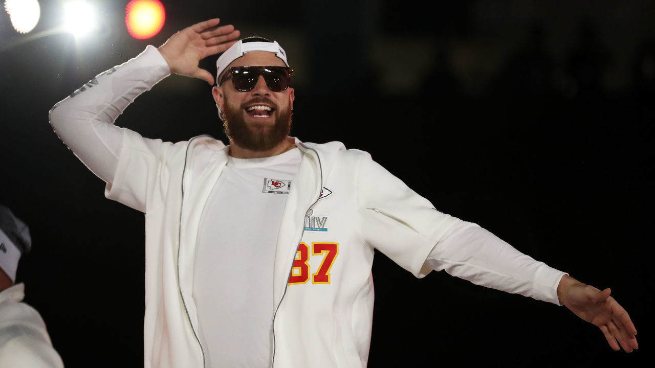 MIAMI, FLORIDA - JANUARY 27: Tight end Travis Kelce #87 of the Kansas City Chiefs makes his entrance to Super Bowl Opening Night presented by BOLT24 at Marlins Park on January 27, 2020 in Miami, Florida.