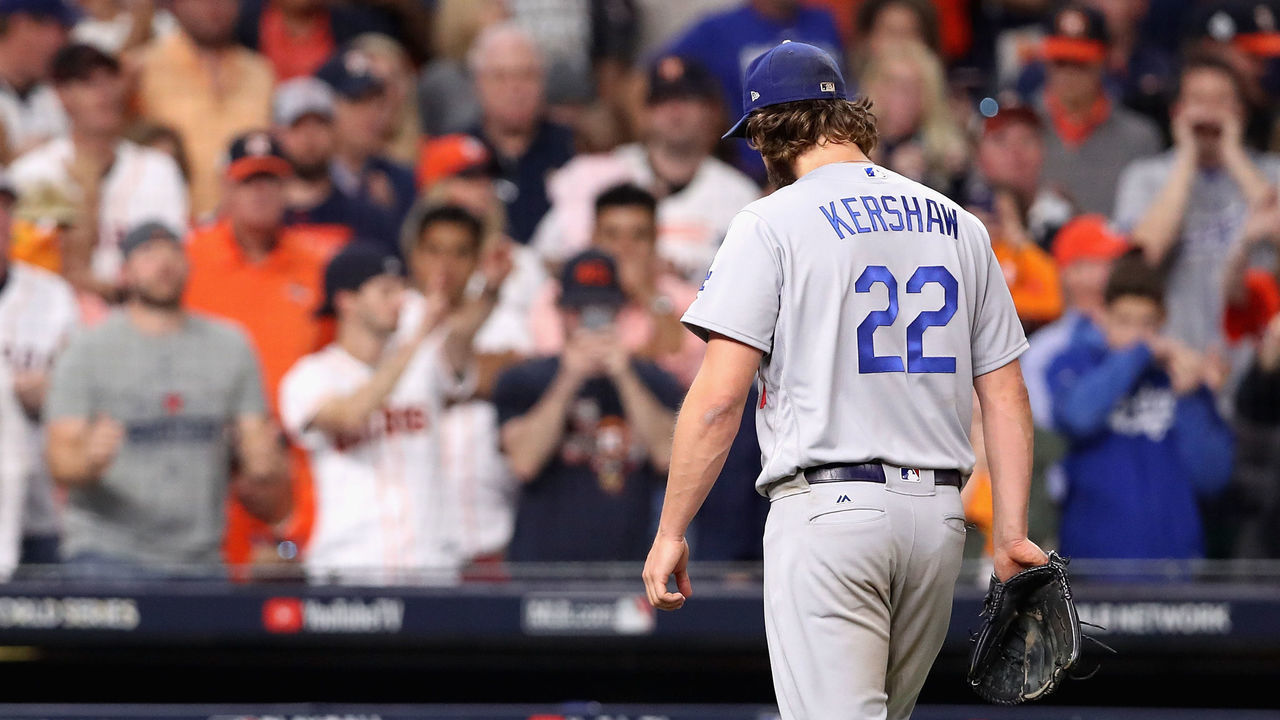 HOUSTON, TX - OCTOBER 29: Clayton Kershaw #22 of the Los Angeles Dodgers walks to the dugout as he exits the game during the fifth inning against the Houston Astros in game five of the 2017 World Series at Minute Maid Park on October 29, 2017 in Houston, Texas.