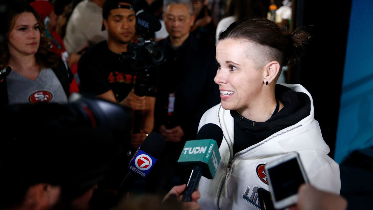 MIAMI, FLORIDA - JANUARY 27: Offensive assistant coach Katie Sowers of the San Francisco 49ers speaks to the media during Super Bowl Opening Night presented by BOLT24 at Marlins Park on January 27, 2020 in Miami, Florida.