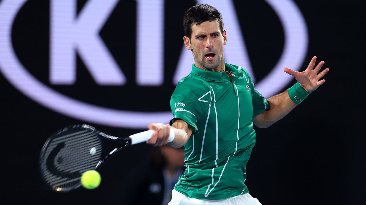MELBOURNE, AUSTRALIA - JANUARY 28: Novak Djokovic of Serbia plays a forehand during his Men's Singles Quarterfinals match against Milos Raonic of Canada on day nine of the 2020 Australian Open at Melbourne Park on January 28, 2020 in Melbourne, Australia.