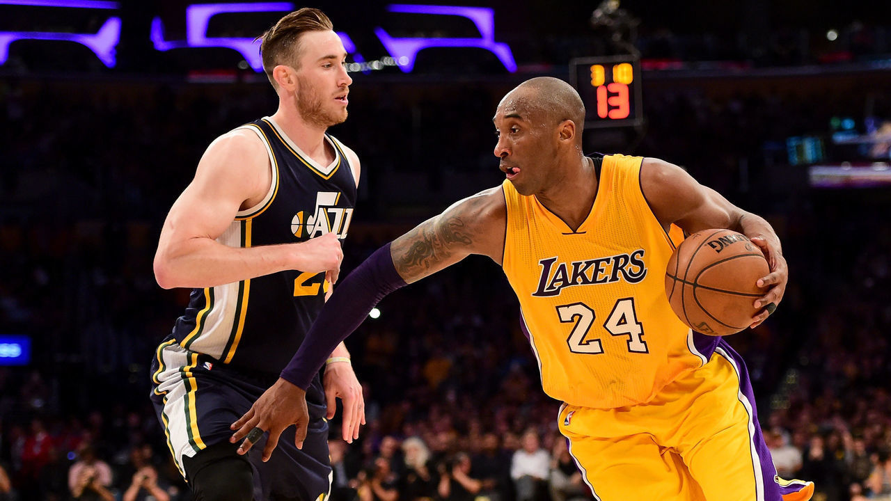 LOS ANGELES, CA - APRIL 13: Kobe Bryant #24 of the Los Angeles Lakers drives on Gordon Hayward #20 of the Utah Jazz in the fourth quarter at Staples Center on April 13, 2016 in Los Angeles, California.
