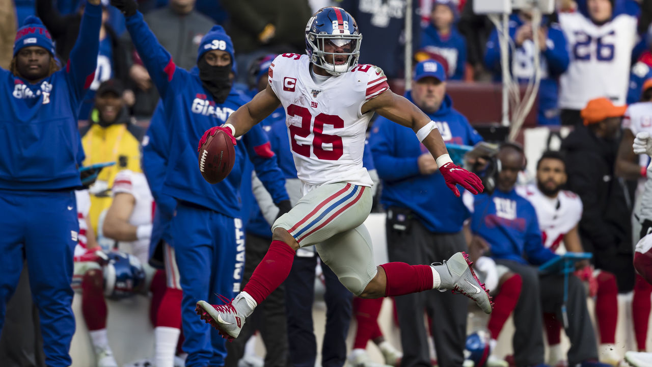 LANDOVER, MD - DECEMBER 22: Saquon Barkley #26 of the New York Giants carries the ball during the second half against the Washington Redskins at FedExField on December 22, 2019 in Landover, Maryland.