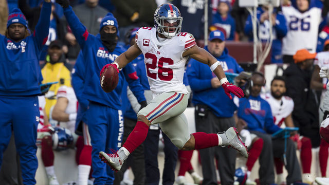 LANDOVER, MD - DECEMBER 22: Saquon Barkley #26 of the New York Giants carries the ball during the second half against the Washington Redskins at FedExField on December 22, 2019 in Landover, Maryland.