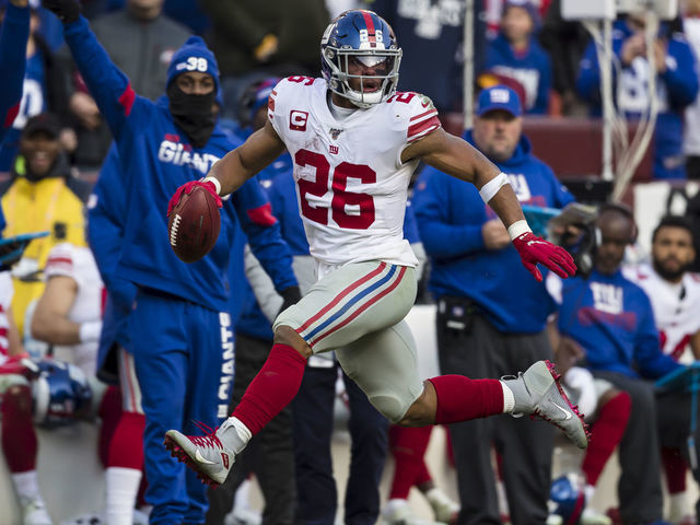LANDOVER, MD - DECEMBER 22: Saquon Barkley #26 of the New York Giants carries the ball during the second half against the Washington Redskins at FedExField on December 22, 2019 in Landover, Maryland.