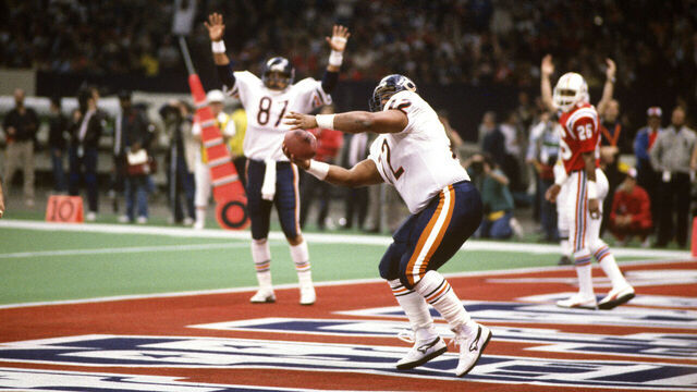 LOUISIANA, NO - JANUARY 26: William Perry #72 celebrates after scoring a touchdown against the New England Patriots during Superbowl XX at the Louisiana Superdome January 26, 1986 in New Orleans, Louisiana. The Bears won the Super Bowl 46-10.