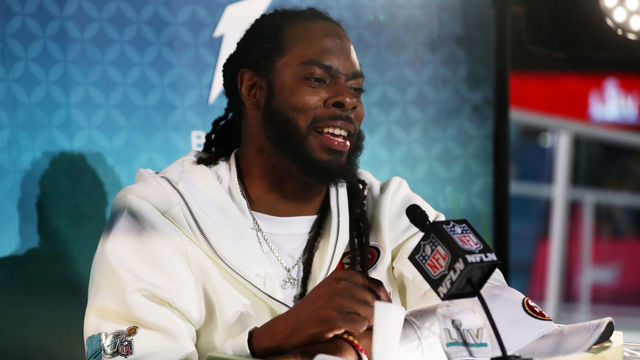 MIAMI, FLORIDA - JANUARY 27: Cornerback Richard Sherman #25 of the San Francisco 49ers speaks to the media during Super Bowl Opening Night presented by BOLT24 at Marlins Park on January 27, 2020 in Miami, Florida.