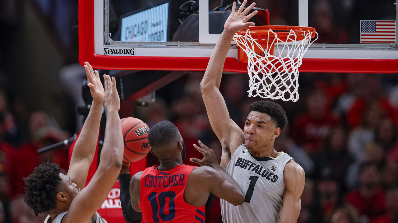 CHICAGO, IL - DECEMBER 21: Jalen Crutcher #10 of the Dayton Flyers shoots the ball during the game against Tyler Bey #1 of the Colorado Buffaloes at United Center on December 21, 2019 in Chicago, Illinois.