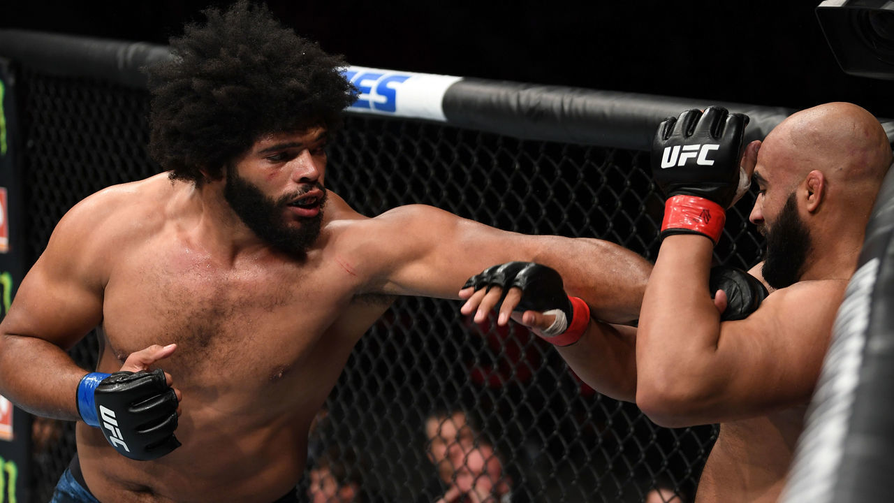 OTTAWA, ON - MAY 04: (L-R) Juan Adams punches Arjan Singh Bhullar of Canada in their heavyweight bout during the UFC Fight Night event at Canadian Tire Centre on May 4, 2019 in Ottawa, Ontario, Canada.