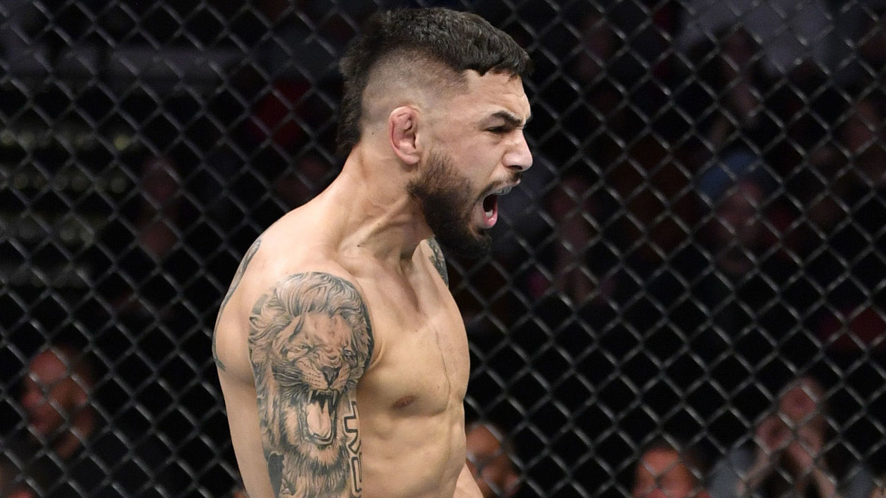 RALEIGH, NORTH CAROLINA - JANUARY 25: Alex Perez celebrates after his submission victory over Jordan Espinosa in their flyweight fight during the UFC Fight Night event at PNC Arena on January 25, 2020 in Raleigh, North Carolina.