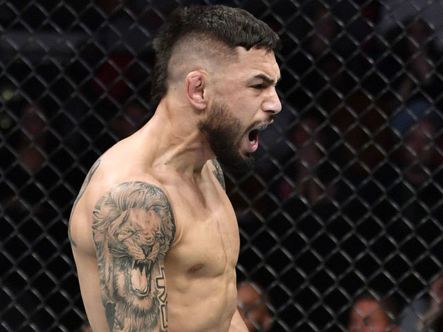 RALEIGH, NORTH CAROLINA - JANUARY 25: Alex Perez celebrates after his submission victory over Jordan Espinosa in their flyweight fight during the UFC Fight Night event at PNC Arena on January 25, 2020 in Raleigh, North Carolina.