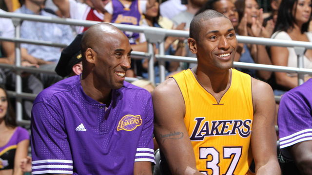 HONOLULU, HI - OCTOBER 6: Kobe Bryant #24 of the Los Angeles Lakers and Metta World Peace #37 of the Los Angeles Lakers sit on the bench against the Utah Jazz during a preseason game on October 6, 2015 at the Stan Sheriff Center in Honolulu, Hawaii. Mandatory Copyright Notice: Copyright 2015 NBAE