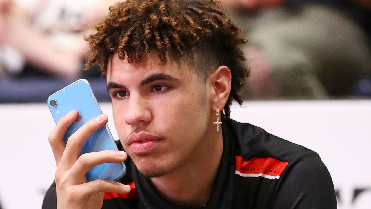 WOLLONGONG, AUSTRALIA - DECEMBER 16: Injured Hawks players Lamelo Ball watches on from the bench during the warm-up before the round 11 NBL match between the Illawarra Hawks and Melbourne United at WIN Entertainment Centre on December 16, 2019 in Wollongong, Australia.