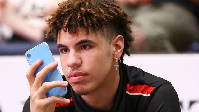 WOLLONGONG, AUSTRALIA - DECEMBER 16: Injured Hawks players Lamelo Ball watches on from the bench during the warm-up before the round 11 NBL match between the Illawarra Hawks and Melbourne United at WIN Entertainment Centre on December 16, 2019 in Wollongong, Australia.