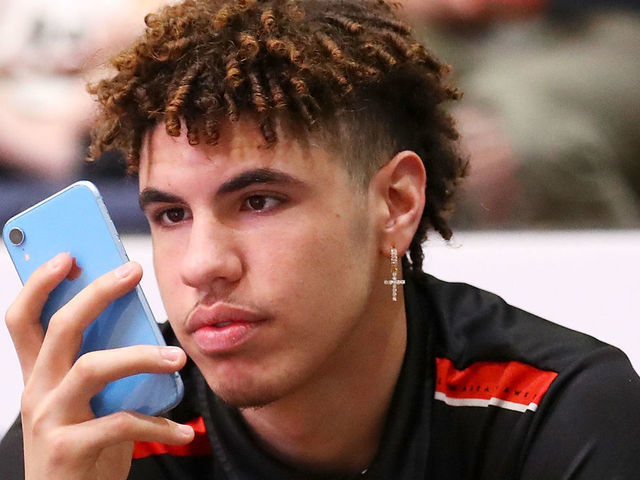 WOLLONGONG, AUSTRALIA - DECEMBER 16: Injured Hawks players Lamelo Ball watches on from the bench during the warm-up before the round 11 NBL match between the Illawarra Hawks and Melbourne United at WIN Entertainment Centre on December 16, 2019 in Wollongong, Australia.