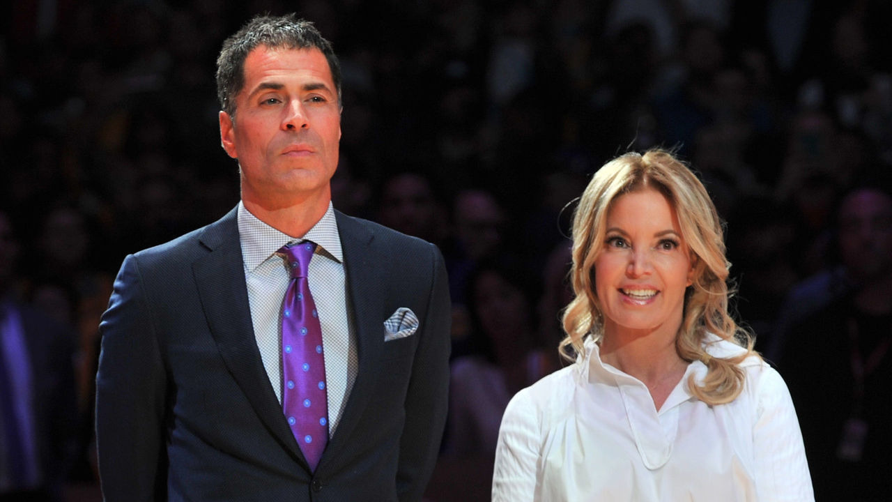 LOS ANGELES, CA - DECEMBER 18: Rob Pelinka and Jeanie Buss attend Kobe Bryant's jersey retirement ceremony during a basketball game between the Los Angeles Lakers and the Golden State Warriors at Staples Center on December 18, 2017 in Los Angeles, California.