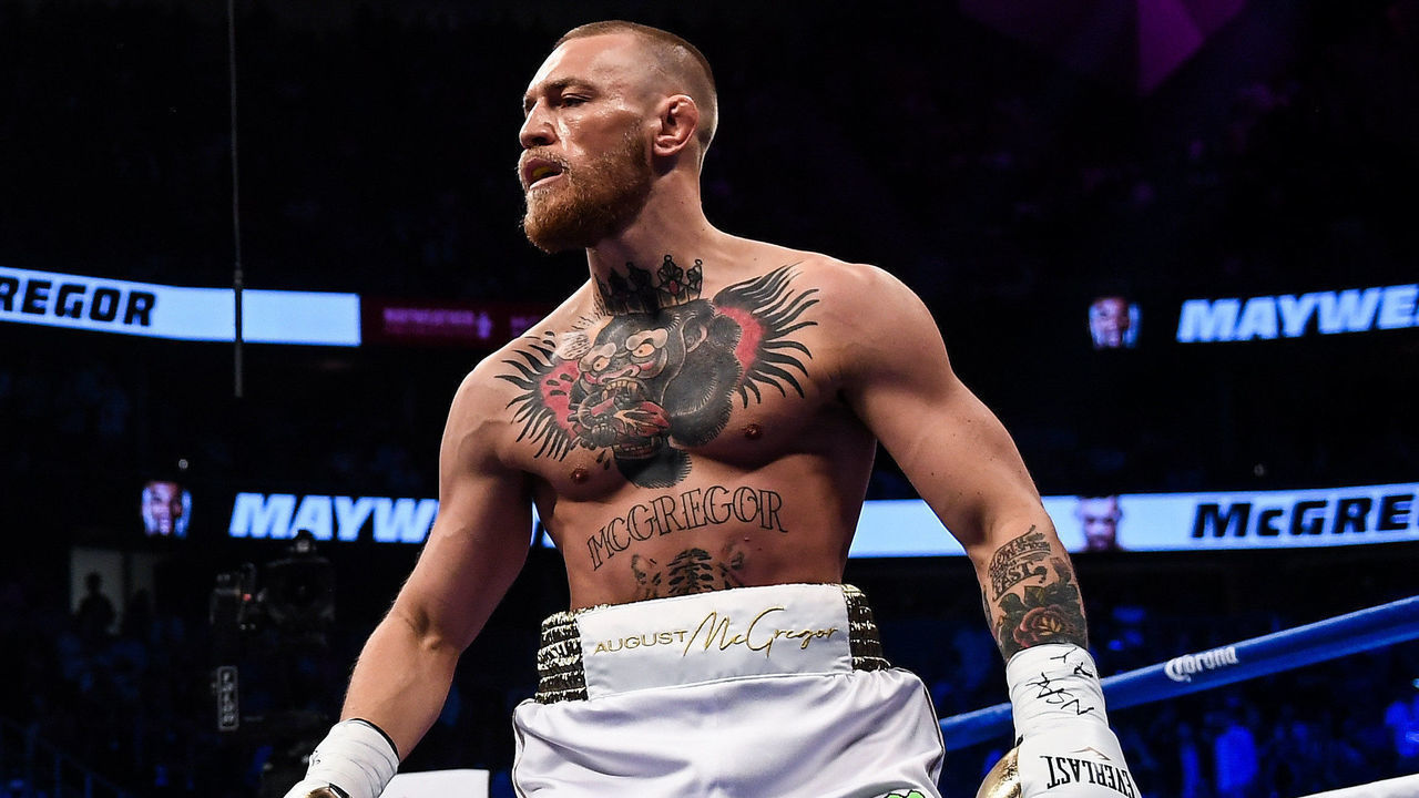 Nevada , United States - 26 August 2017; Conor McGregor, right, and Floyd Mayweather Jr during their super welterweight boxing match at T-Mobile Arena in Las Vegas, USA.