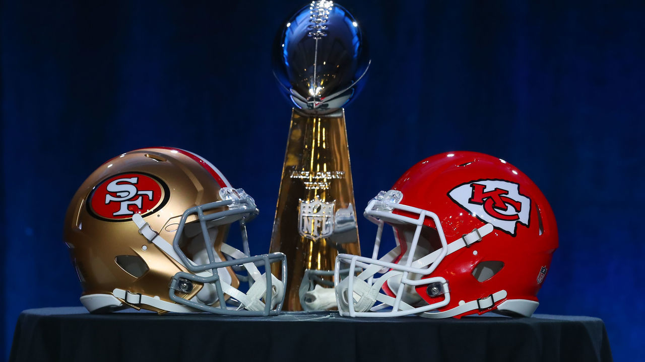 MIAMI, FL - JANUARY 29: The Vince Lombardi Trophy is displayed before the Commissioners press conference with a San Francisco 49ers and Kansas City Chiefs helmet onn January 29, 2020 at the Hilton Downtown in Miami, FL.