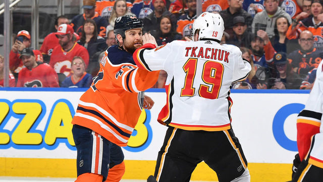 EDMONTON, AB - JANUARY 29: Zack Kassian #44 of the Edmonton Oilers fights with Matthew Tkachuk #19 of the Calgary Flames on January 29, 2020, at Rogers Place in Edmonton, Alberta, Canada.
