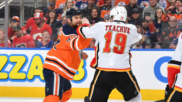 EDMONTON, AB - JANUARY 29: Zack Kassian #44 of the Edmonton Oilers fights with Matthew Tkachuk #19 of the Calgary Flames on January 29, 2020, at Rogers Place in Edmonton, Alberta, Canada.