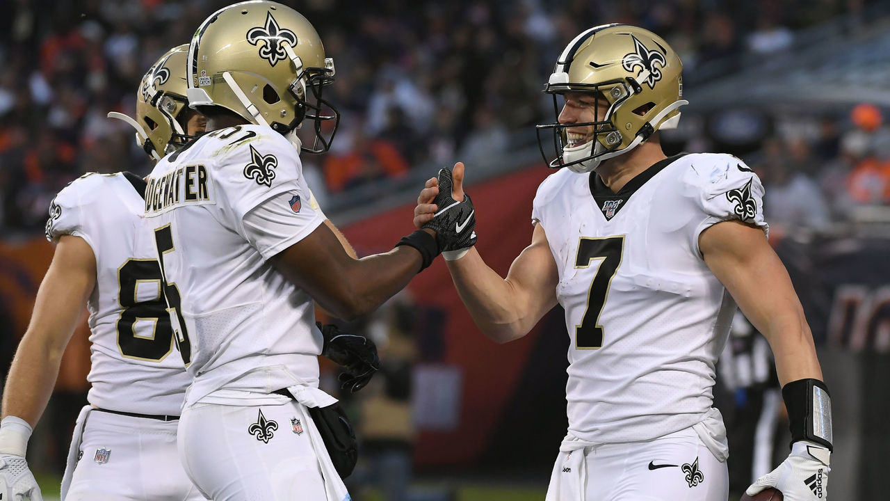 CHICAGO, IL - OCTOBER 20: New Orleans Saints quarterback Teddy Bridgewater (5) celebrates after a touchdown scored by New Orleans Saints quarterback Taysom Hill (7) in game action during a game between the Chicago Bears and the New Orleans Saints on October 20, 2019 at Soldier Field in Chicago, IL.