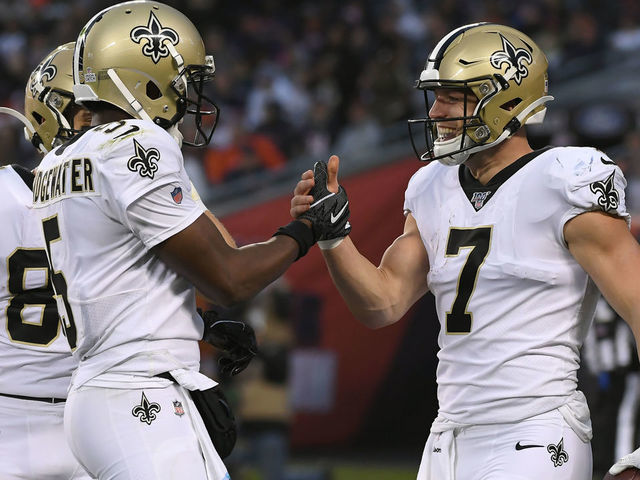 CHICAGO, IL - OCTOBER 20: New Orleans Saints quarterback Teddy Bridgewater (5) celebrates after a touchdown scored by New Orleans Saints quarterback Taysom Hill (7) in game action during a game between the Chicago Bears and the New Orleans Saints on October 20, 2019 at Soldier Field in Chicago, IL.