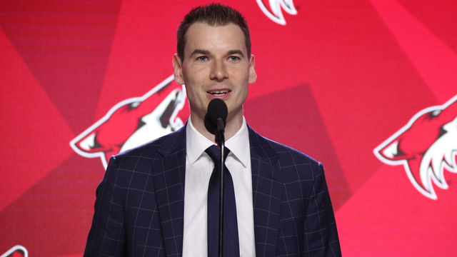 VANCOUVER, BRITISH COLUMBIA - JUNE 21: General manager John Chayka of the Arizona Coyotes speaks onstage during Rounds 2-7 of the 2019 NHL Draft at Rogers Arena on June 22, 2019 in Vancouver, Canada.
