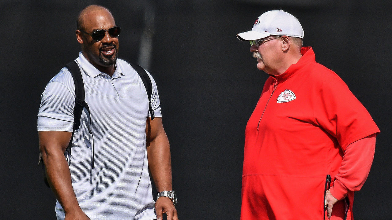 DAVIE, FLORIDA - JANUARY 30: Head Coach Andy Reid of the Kansas City Chiefs visits with former player Donovan McNabb during the Kansas City Chiefs practice prior to Super Bowl LIV at Baptist Health Training Facility at Nova Southern University on January 30, 2020 in Davie, Florida.