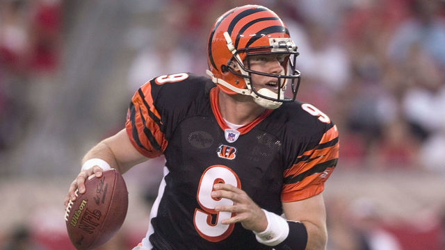 TAMPA, FL - AUGUST 16: Quarterback Carson Palmer #9 of the Cincinnati Bengals drops back to pass against the Tampa Bay Buccaneers during the game at Raymond James Stadium on August 16, 2004 in Tampa, Florida. The Bucs won 20-6.