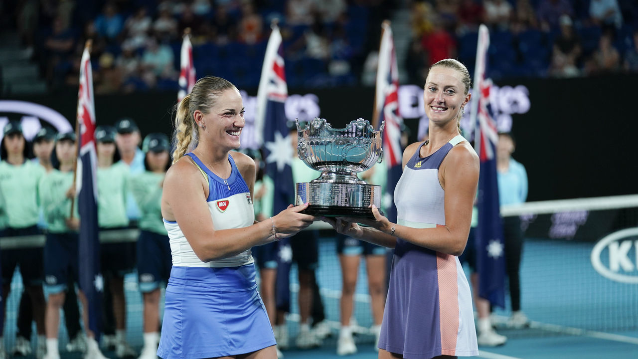 MELBOURNE, AUSTRALIA - JANUARY 31: Timea Babos of Hungary and Kristina Mladenovic of France pose with the championship trophy after winning their Womens Doubles Final match against Su-Wei Hsieh of Taiwan and Barbora Strycova of Czech Republic on day twelve of the 2020 Australian Open at Melbourne Park on January 31, 2020 in Melbourne, Australia.