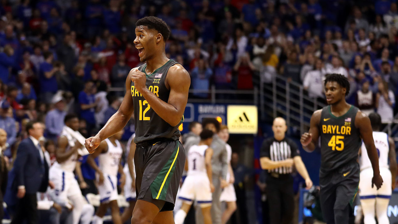 LAWRENCE, KANSAS - JANUARY 11: Jared Butler #12 of the Baylor Bears reacts after scoring during the game against the Kansas Jayhawks at Allen Fieldhouse on January 11, 2020 in Lawrence, Kansas.