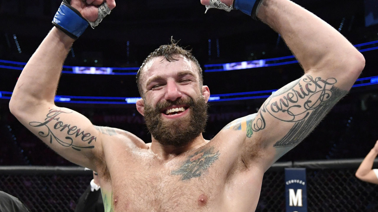 RALEIGH, NORTH CAROLINA - JANUARY 25: Michael Chiesa celebrates after his decision victory over Rafael Dos Anjos of Brazil in their welterweight fight during the UFC Fight Night event at PNC Arena on January 25, 2020 in Raleigh, North Carolina.