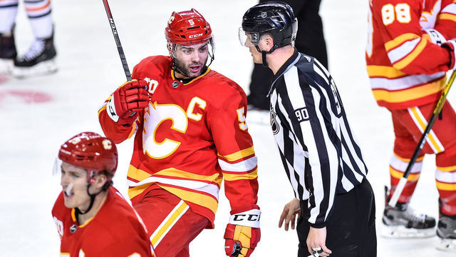 CALGARY, AB - JANUARY 11: Calgary Flames Defenceman Mark Giordano (5) objects to a call during the third period of an NHL game where the Calgary Flames hosted the Edmonton Oilers on January 11, 2020, at the Scotiabank Saddledome in Calgary, AB.