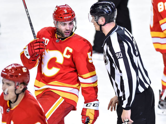 CALGARY, AB - JANUARY 11: Calgary Flames Defenceman Mark Giordano (5) objects to a call during the third period of an NHL game where the Calgary Flames hosted the Edmonton Oilers on January 11, 2020, at the Scotiabank Saddledome in Calgary, AB.