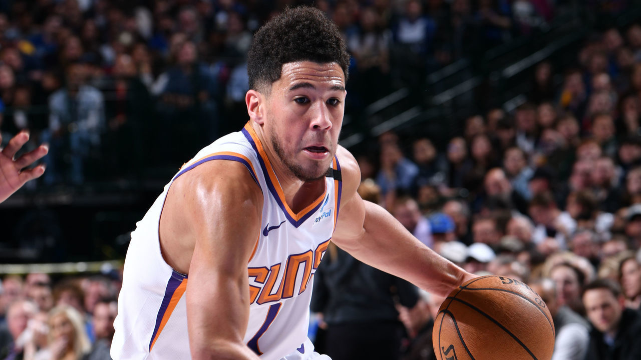 DALLAS, TX - JANUARY 28: Devin Booker #1 of the Phoenix Suns drives to the basket against the Dallas Mavericks on January 28, 2020 at the American Airlines Center in Dallas, Texas. Mandatory Copyright Notice: Copyright 2020 NBAE