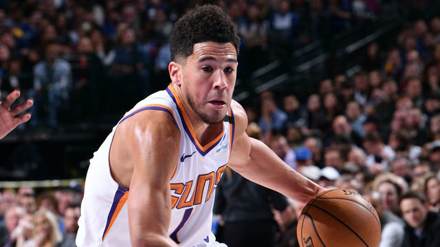 DALLAS, TX - JANUARY 28: Devin Booker #1 of the Phoenix Suns drives to the basket against the Dallas Mavericks on January 28, 2020 at the American Airlines Center in Dallas, Texas. Mandatory Copyright Notice: Copyright 2020 NBAE