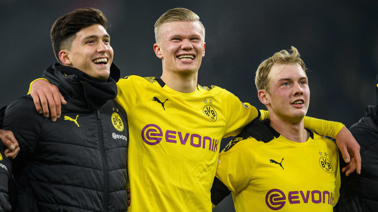 DORTMUND, GERMANY - JANUARY 24: L-R Leonardo Balerdi, Erling Haaland and Julian Brandt of Dortmund react after the Bundesliga match between Borussia Dortmund and 1. FC Koeln at Signal Iduna Park on January 24, 2020 in Dortmund, Germany.