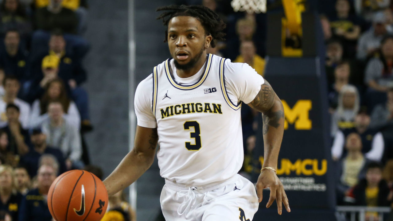 ANN ARBOR, MI - JANUARY 25: Michigan Wolverines guard Zavier Simpson (3) brings the ball up the court during a regular season Big Ten Conference game between the Illinois Fighting Illini (21) and the Michigan Wolverines on January 25, 2020, at Crisler Center in Ann Arbor, Michigan.