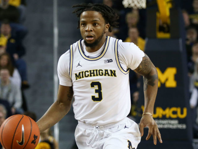 ANN ARBOR, MI - JANUARY 25: Michigan Wolverines guard Zavier Simpson (3) brings the ball up the court during a regular season Big Ten Conference game between the Illinois Fighting Illini (21) and the Michigan Wolverines on January 25, 2020, at Crisler Center in Ann Arbor, Michigan.