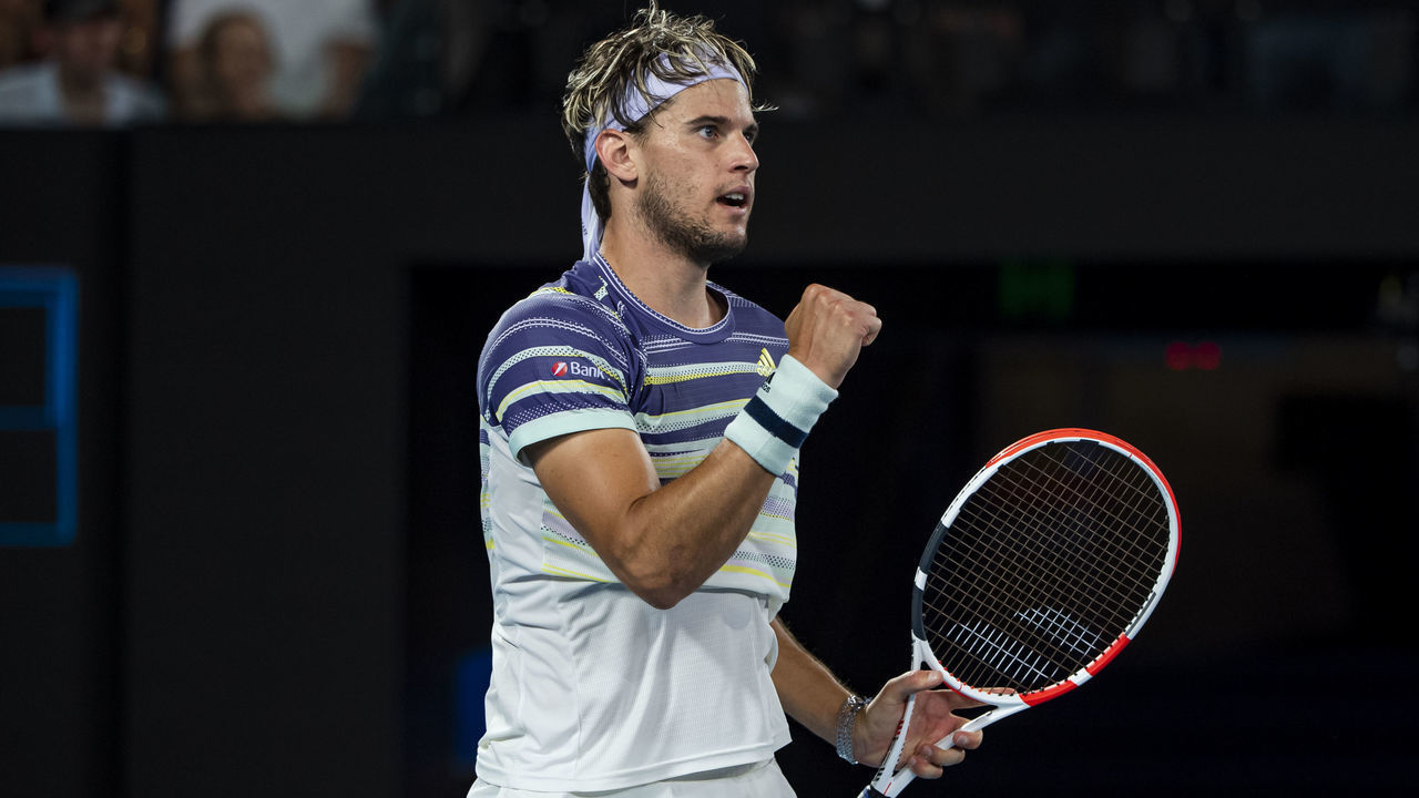 MELBOURNE, AUSTRALIA - JANUARY 31: Dominic Thiem of Austria celebates in his semi-final match against Alexander Zverev of Germany on day twelve of the 2020 Australian Open at Melbourne Park on January 31, 2020 in Melbourne, Australia.