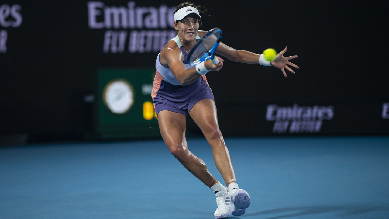 MELBOURNE, AUSTRALIA - FEBRUARY 01: Garbine Muguruza of Spain hits a forehand in her women's singles final match against Sofia Kenin of the United States on day thirteen of the 2020 Australian Open at Melbourne Park on February 01, 2020 in Melbourne, Australia.