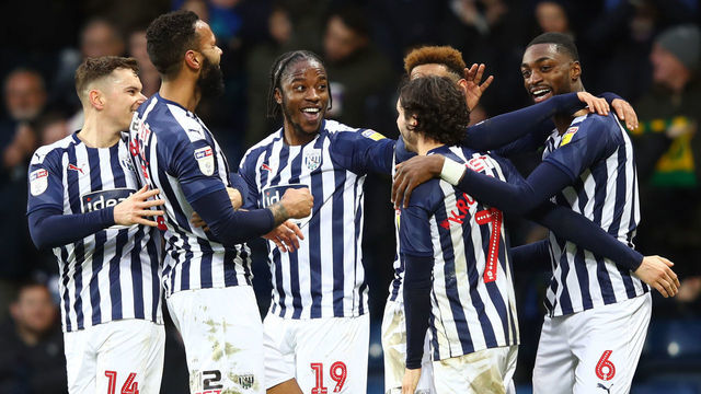 WEST BROMWICH, ENGLAND - FEBRUARY 01: Semi Ajayi of West Bromwich Albion(R) celebrates after scoring his sides second goal with his team mates during the Sky Bet Championship match between West Bromwich Albion and Luton Town at The Hawthorns on February 01, 2020 in West Bromwich, England.
