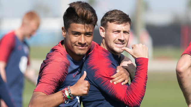 BRADENTON, FL - JANUARY 23: Ulysses Llanez and Paul Arriola of the United States laugh during a drill on January 23, 2020 in Bradenton, Florida.