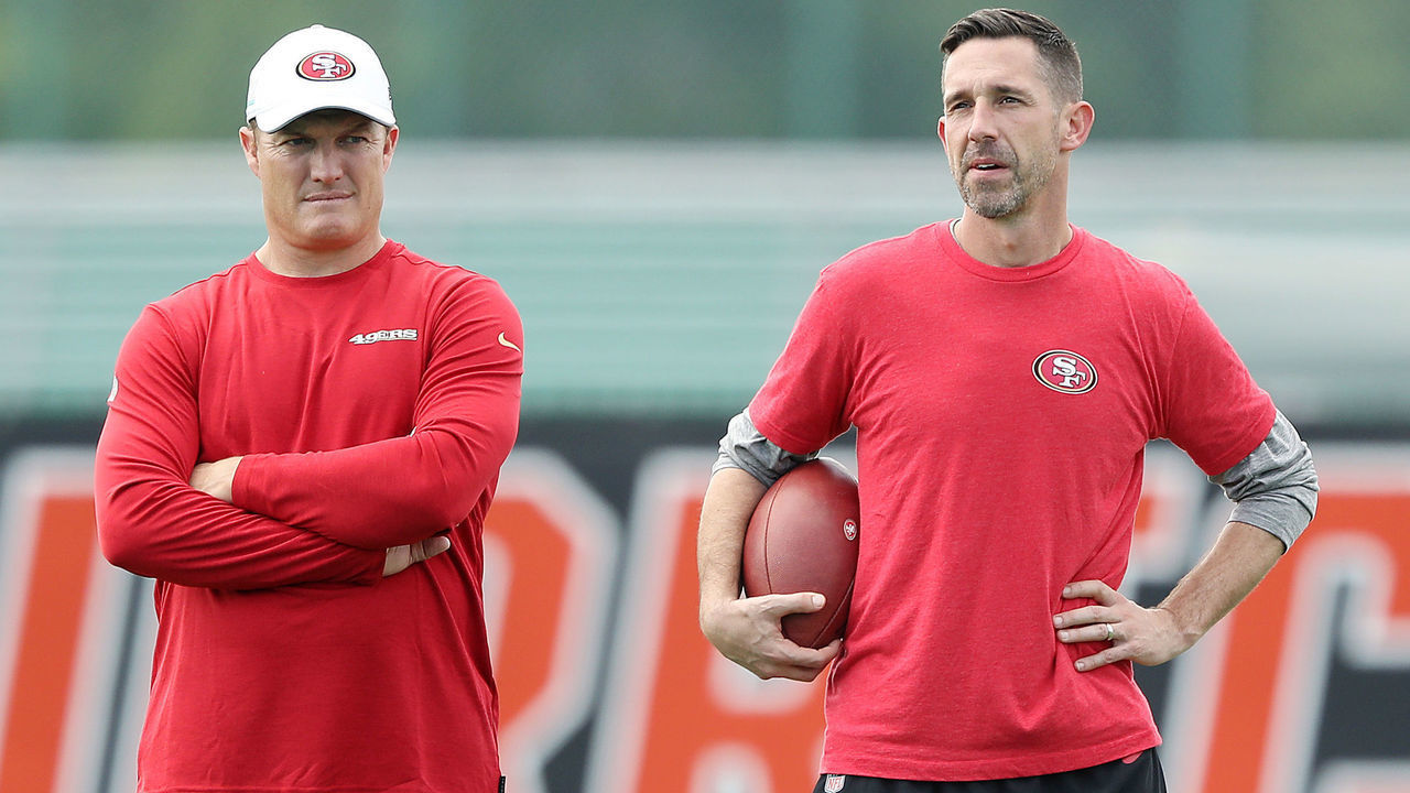 CORAL GABLES, FLORIDA - JANUARY 29: Head coach Kyle Shanahan of the San Francisco 49ers (R) talks with general manager John Lynch during practice for Super Bowl LIV at the Greentree Practice Fields on the campus of the University of Miami on January 29, 2020 in Coral Gables, Florida.