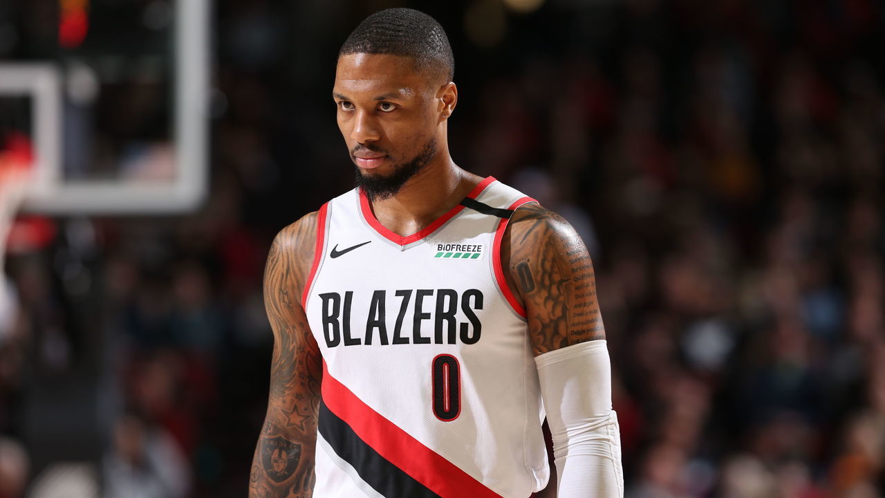 PORTLAND, OR - FEBRUARY 1: Damian Lillard #0 of the Portland Trail Blazers looks on during a game against the Utah Jazz on February 01, 2020 at the Moda Center Arena in Portland, Oregon. Mandatory Copyright Notice: Copyright 2020 NBAE