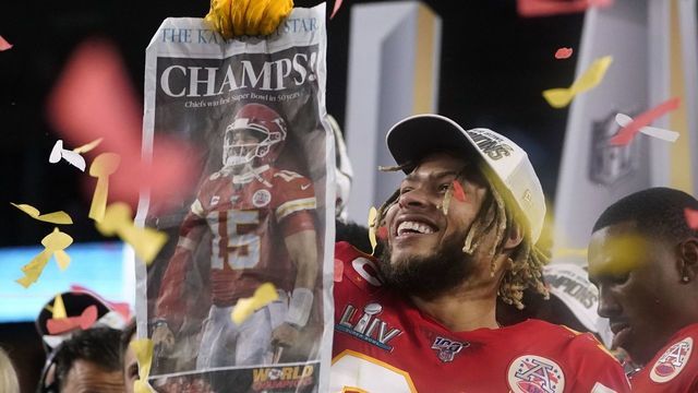 Strong safety for the Kansas City Chiefs Tyrann Mathieu and teammates celebrate on the podium after winning Super Bowl LIV against the San Francisco 49ers at Hard Rock Stadium in Miami Gardens, Florida, on February 2, 2020.