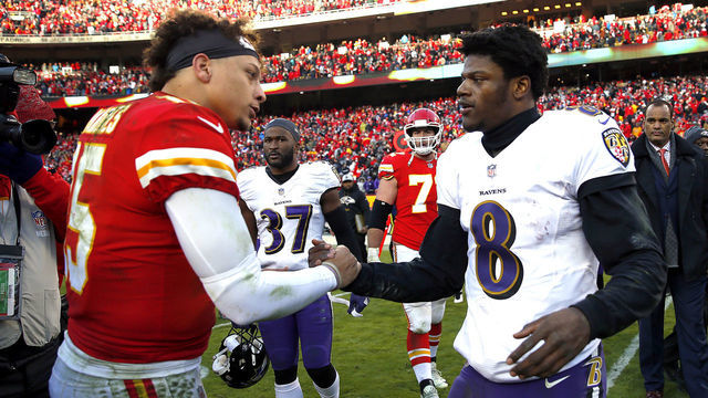 KANSAS CITY, MISSOURI - DECEMBER 09: Quarterback Patrick Mahomes #15 of the Kansas City Chiefs shakes hands with quarterback Lamar Jackson #8 of the Baltimore Ravens after the Chiefs defeated the Ravens 27-24 in overtime to win the game at Arrowhead Stadium on December 09, 2018 in Kansas City, Missouri.