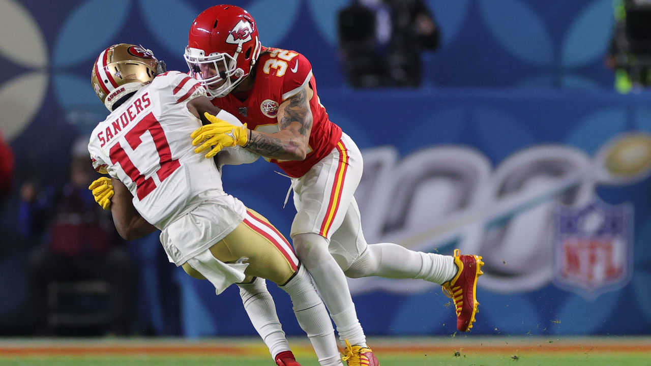 MIAMI, FLORIDA - FEBRUARY 02: Emmanuel Sanders #17 of the San Francisco 49ers is tackled by Tyrann Mathieu #32 of the Kansas City Chiefs in Super Bowl LIV at Hard Rock Stadium on February 02, 2020 in Miami, Florida.