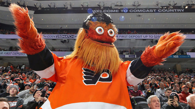 PHILADELPHIA, PA - DECEMBER 19: Gritty, the mascot of the Philadelphia Flyers entertains the crowd during an NHL game against the Buffalo Sabres on December 19, 2019 at the Wells Fargo Center in Philadelphia, Pennsylvania.