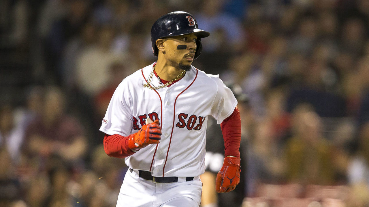BOSTON - SEPTEMBER 8: Boston Red Sox right fielder Mookie Betts (50) runs to first base during the bottom of the first inning. The Boston Red Sox host the New York Yankees in a regular season MLB baseball game at Fenway Park in Boston on Sep. 8, 2019.